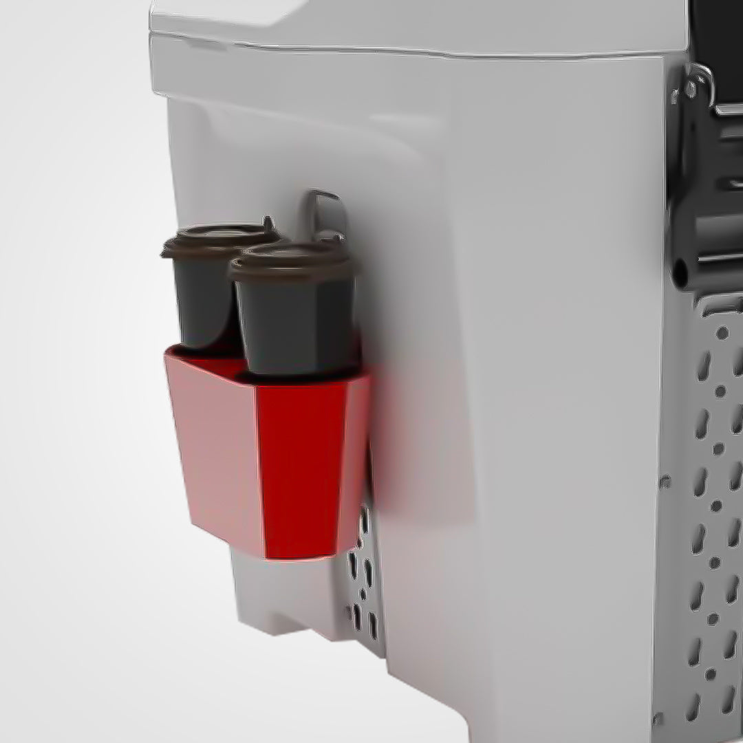 White dual cup holder mounted on a brown carpeted surface, designed to hold two cups securely.