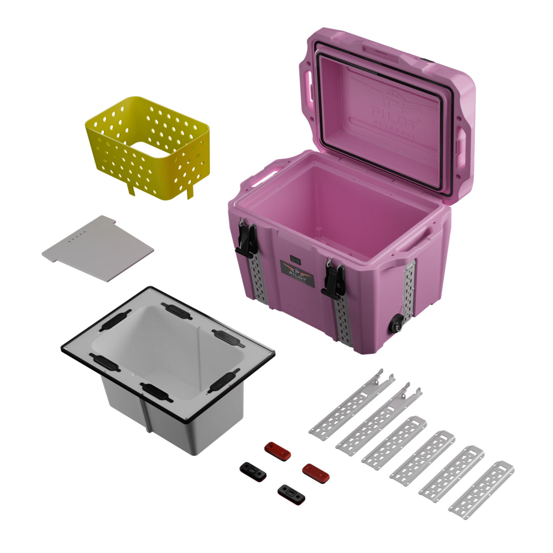 Pink hard-sided outdoor cooler with cam-action latches, molded top and side handles, a front-lower drain plug, and a ‘Pilot Outdoors’ badge on the front. 35/60 QT Cute Pink Cooler, Ice Chest for Women